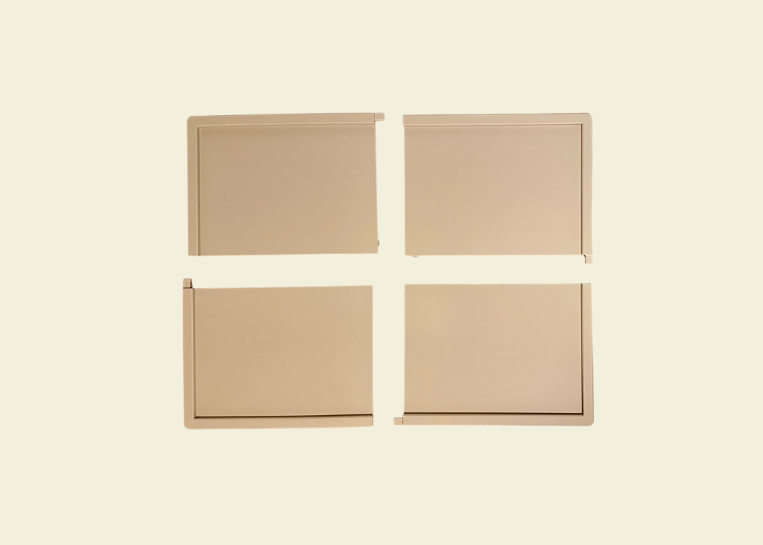 Beige modular 3D-printed PLA puzzle board divided in 4 pieces.
