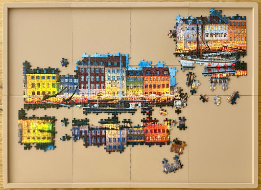 Half completed puzzle on a modular 3D-printed board made of 7 PLA pieces.